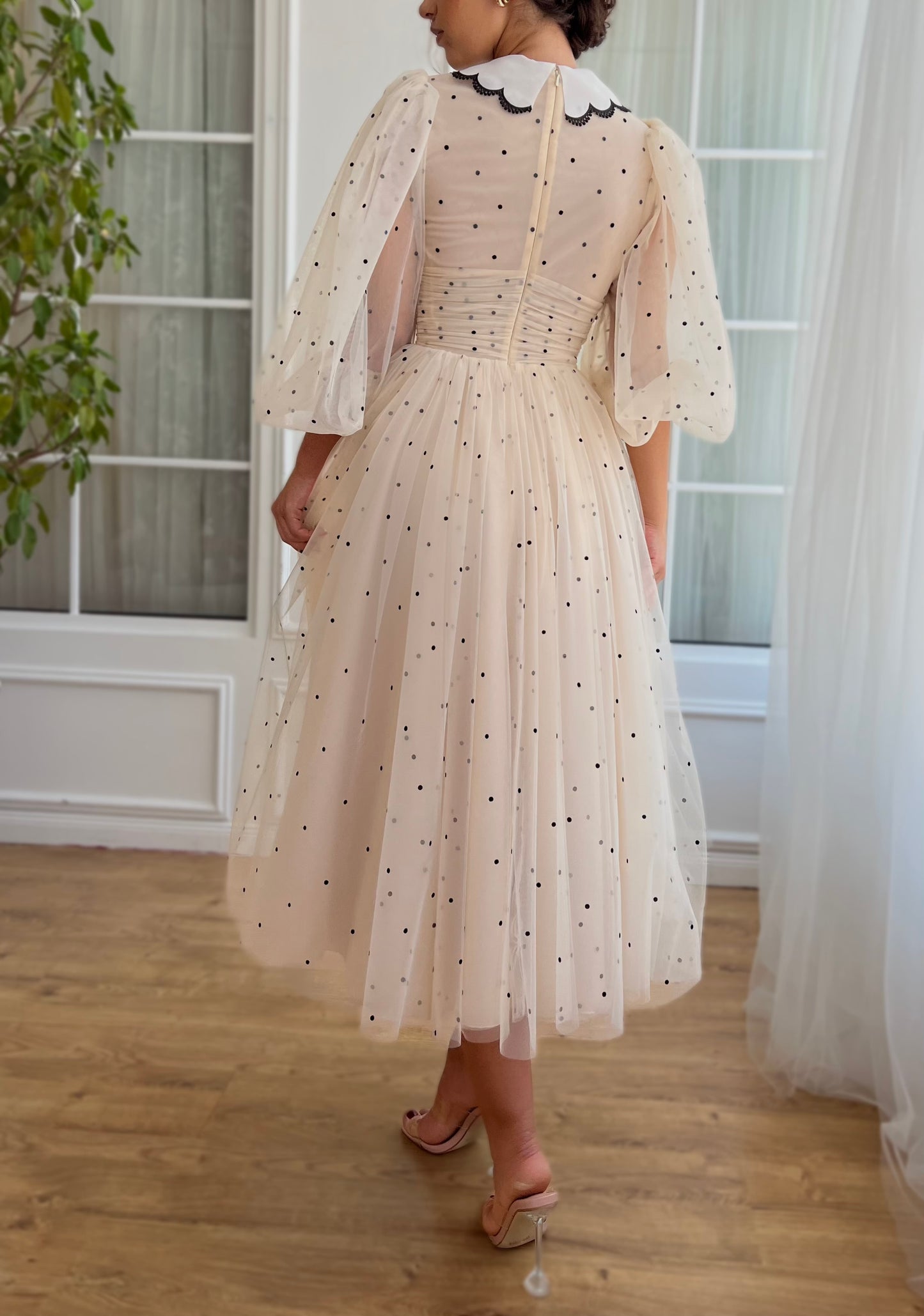 Beige midi dress with long sleeves and polka dot fabric