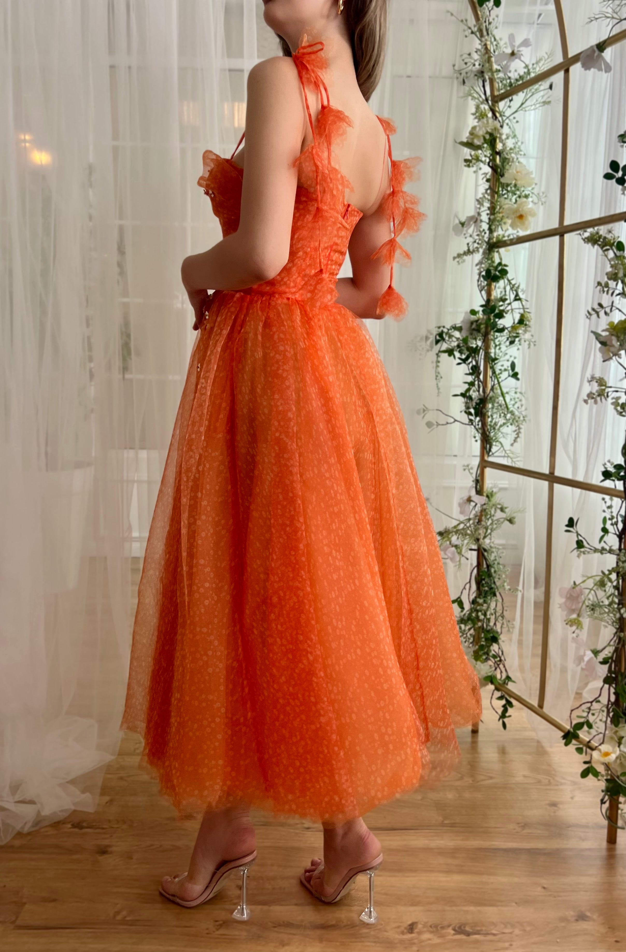 Orange midi dress with straps and embroidery and daisies