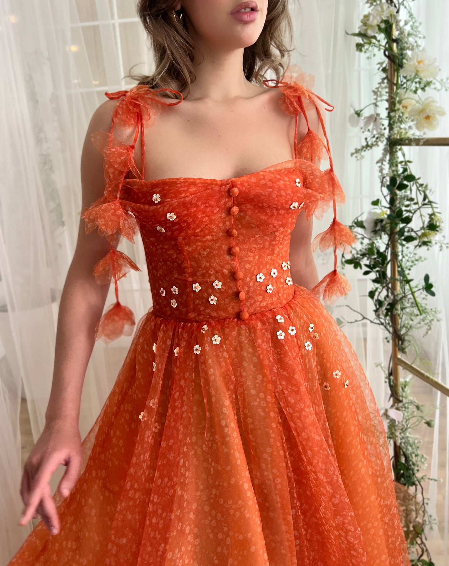 Orange midi dress with straps and embroidery and daisies