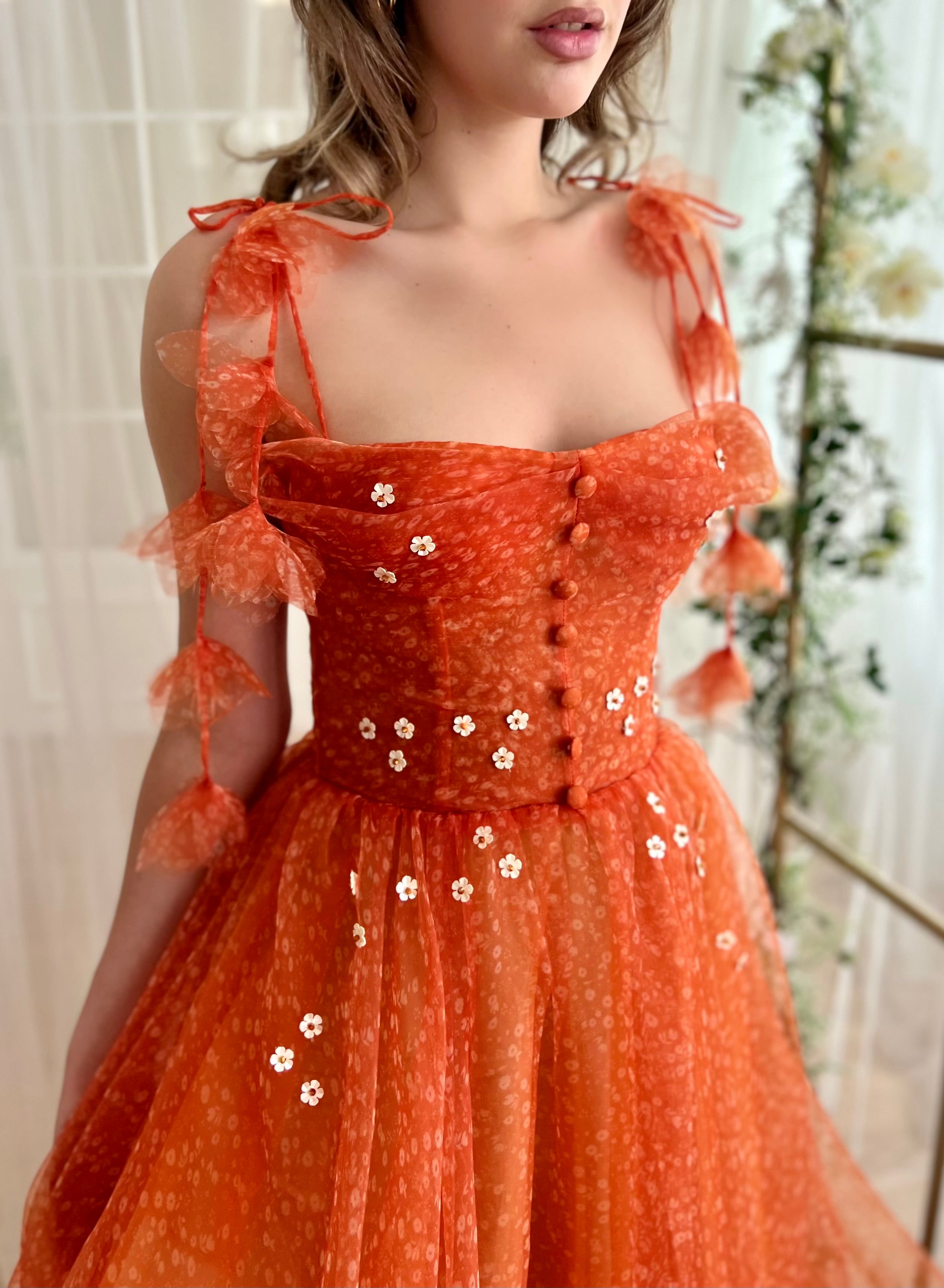 Orange midi dress with straps and embroidery and daisies