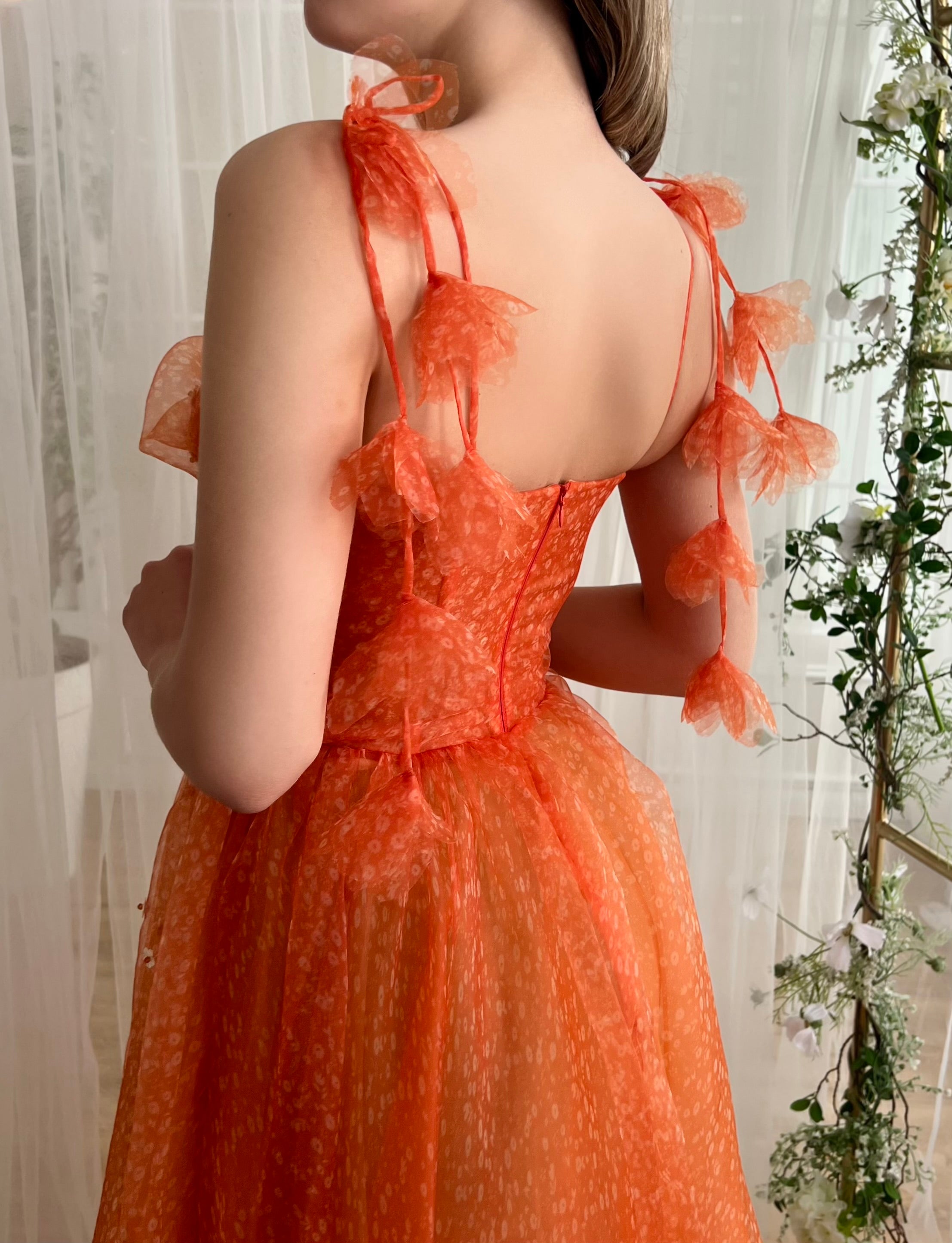 Orange midi dress with straps and embroidery and daisies