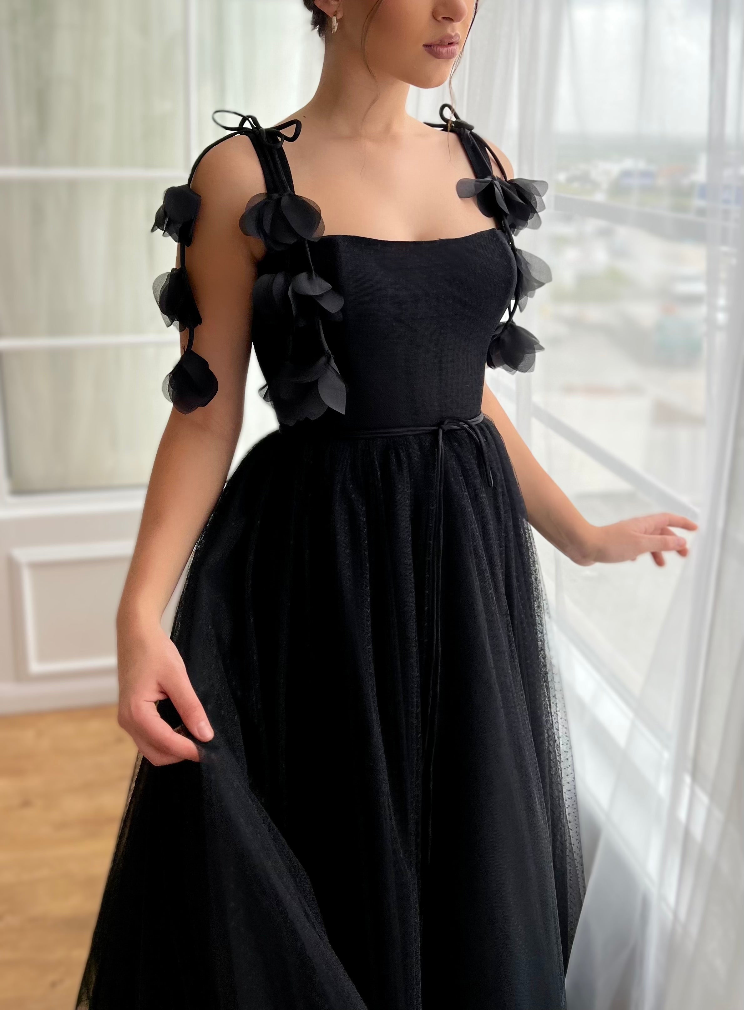 Black midi dress with embroidered flowers and straps