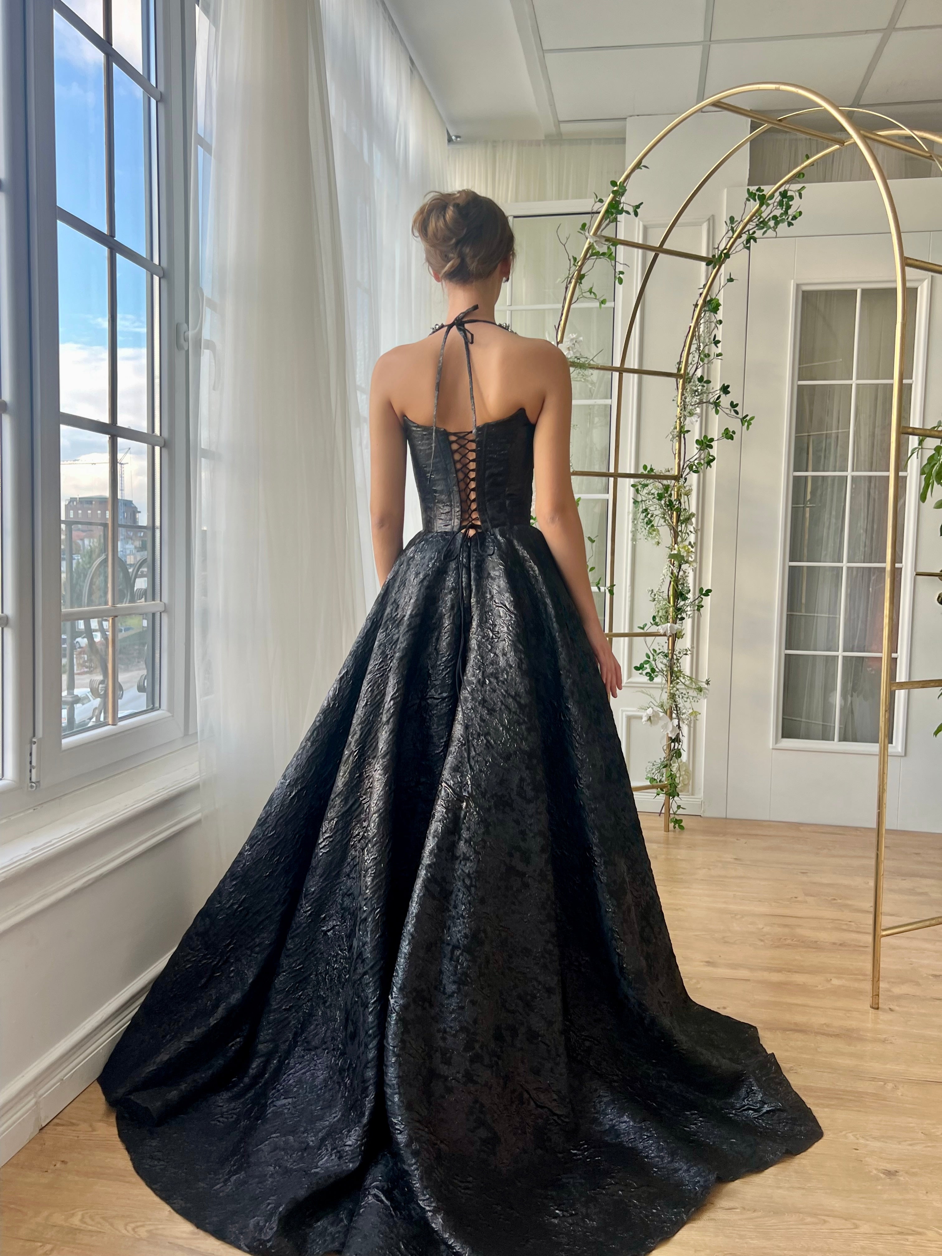 Black A-Line gown with straps and embroidery