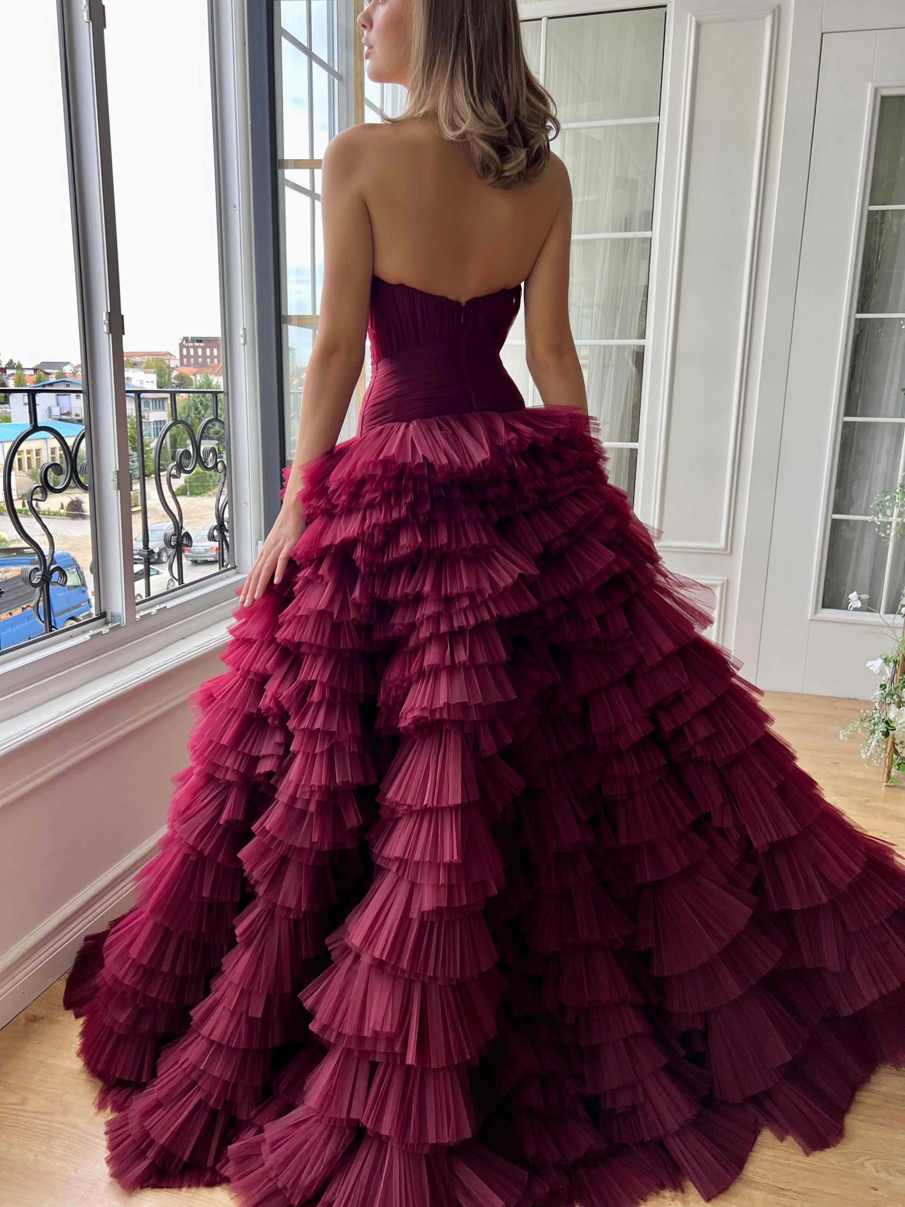 Red A-Line gown with ruffles and no sleeves