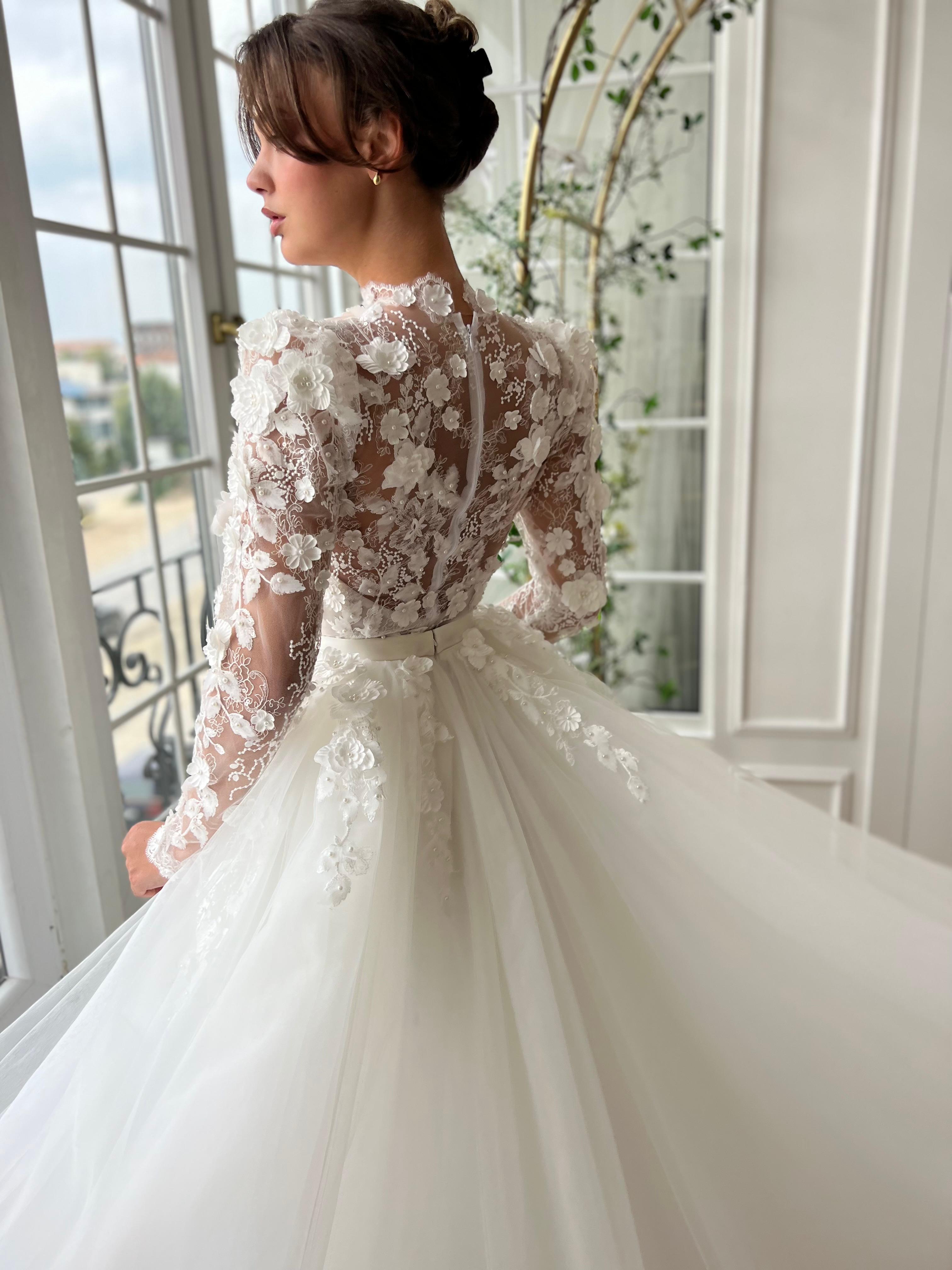 White A-Line bridal gown with long sleeves and embroidery