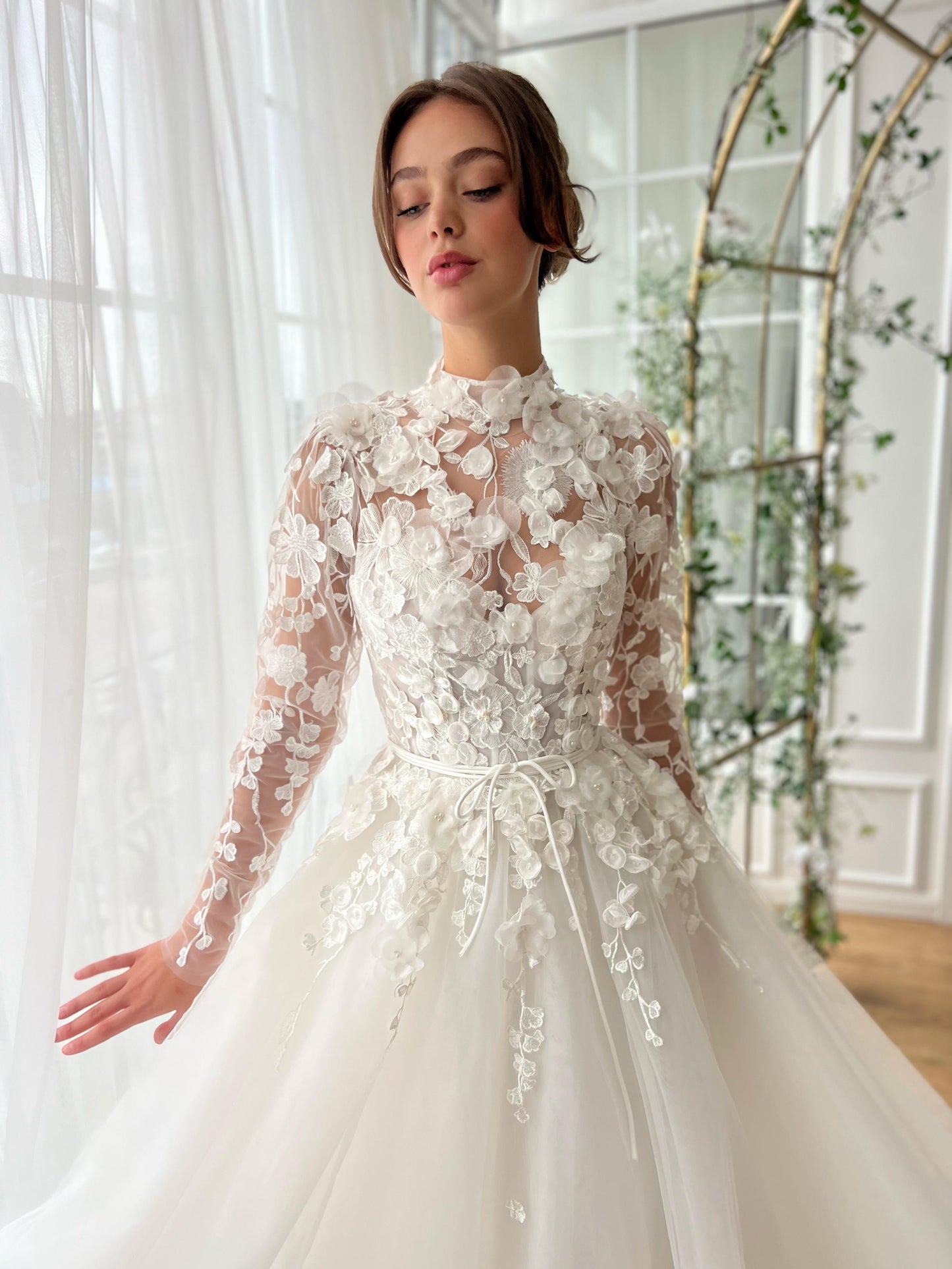 White A-Line bridal gown with long sleeves, embroidery and veil