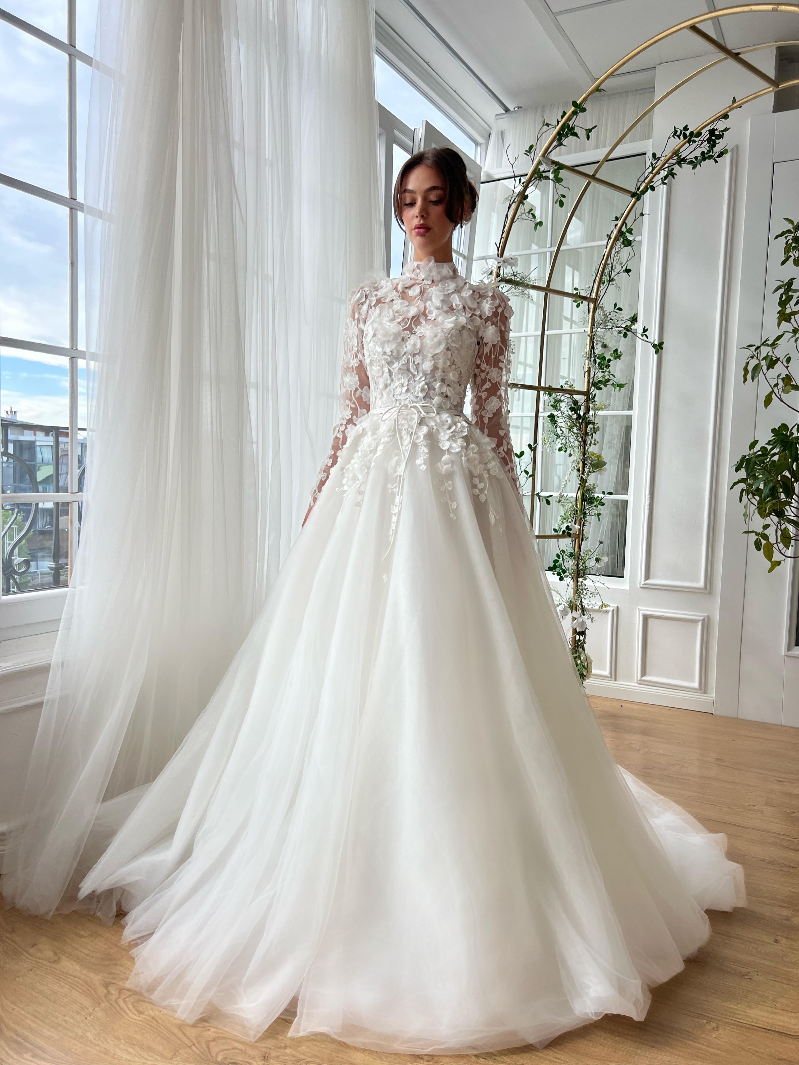 White A-Line bridal gown with long sleeves, embroidery and veil