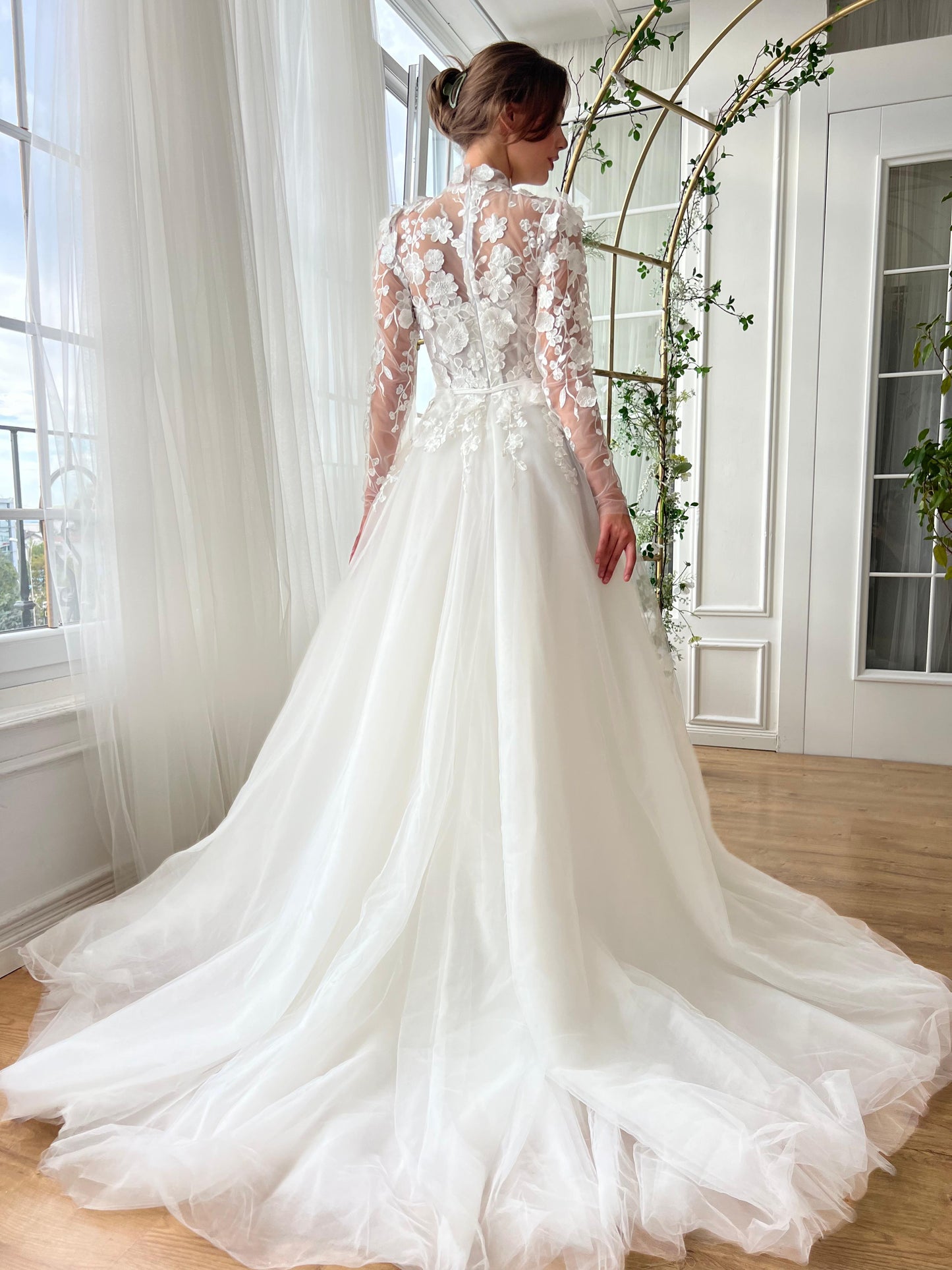 White A-Line bridal gown with long sleeves, embroidery and veil