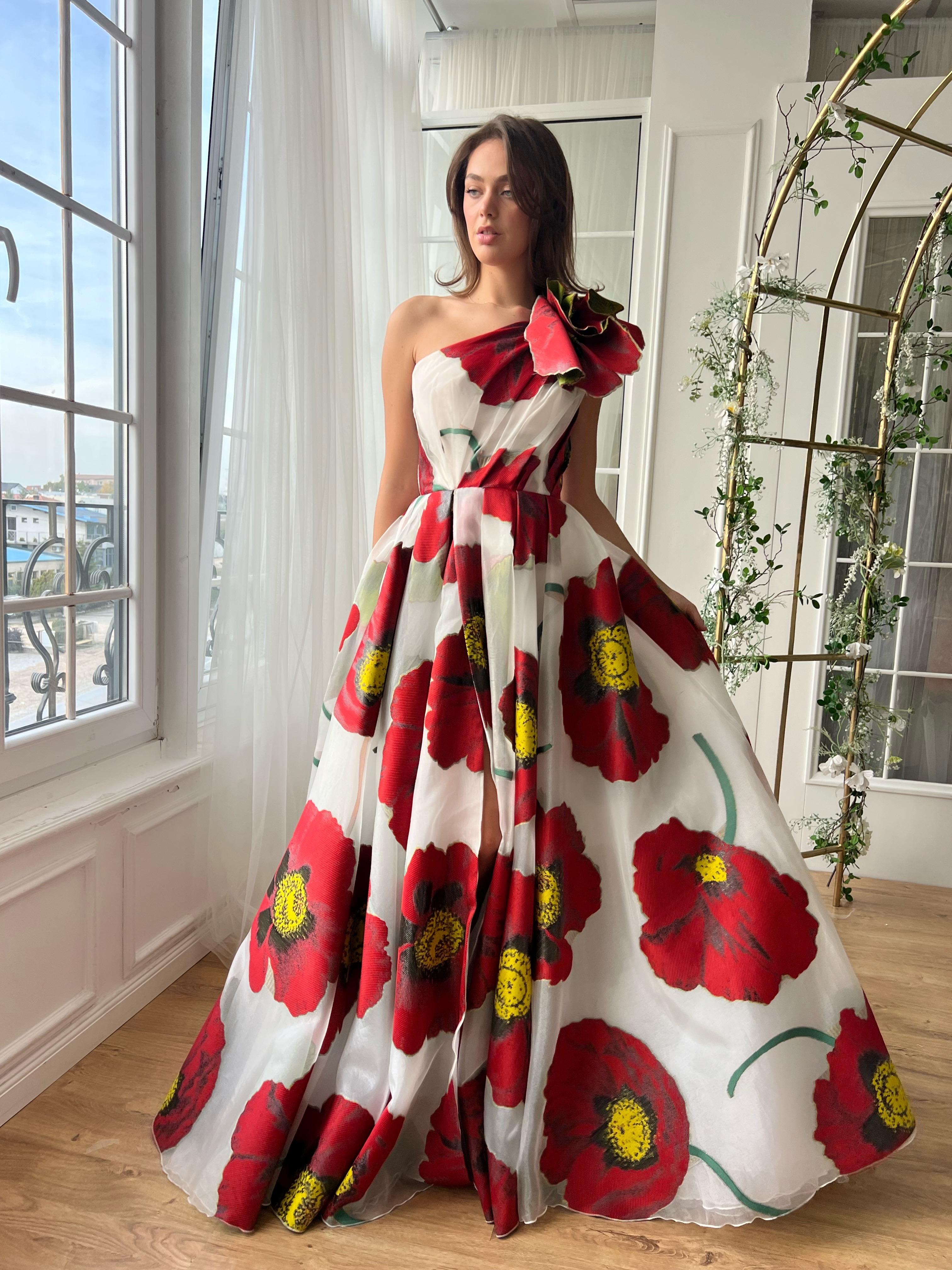 Red and white A-Line gown with one shoulder sleeve, embroidery and printed floral fabric