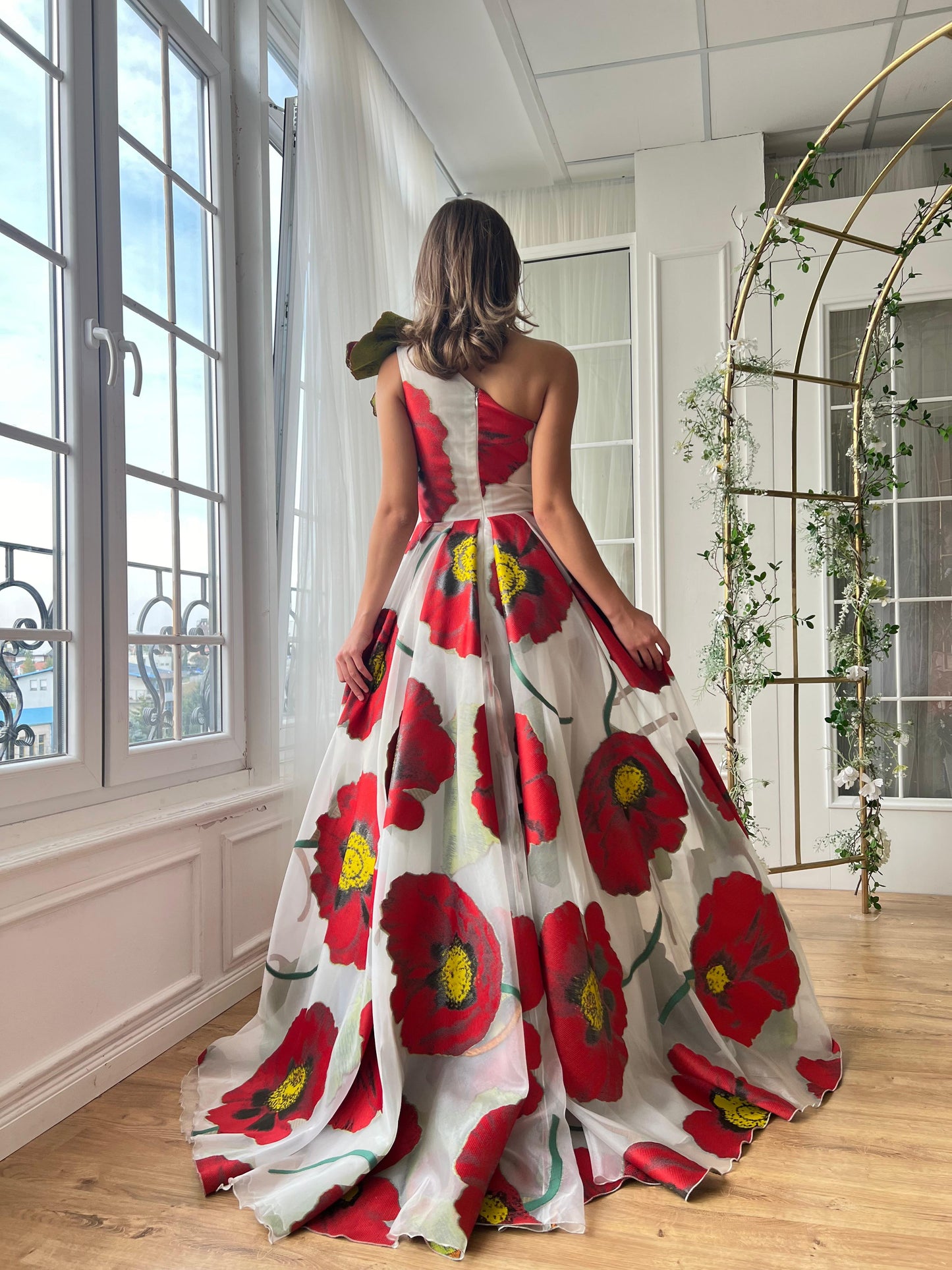 Red and white A-Line gown with one shoulder sleeve, embroidery and printed floral fabric