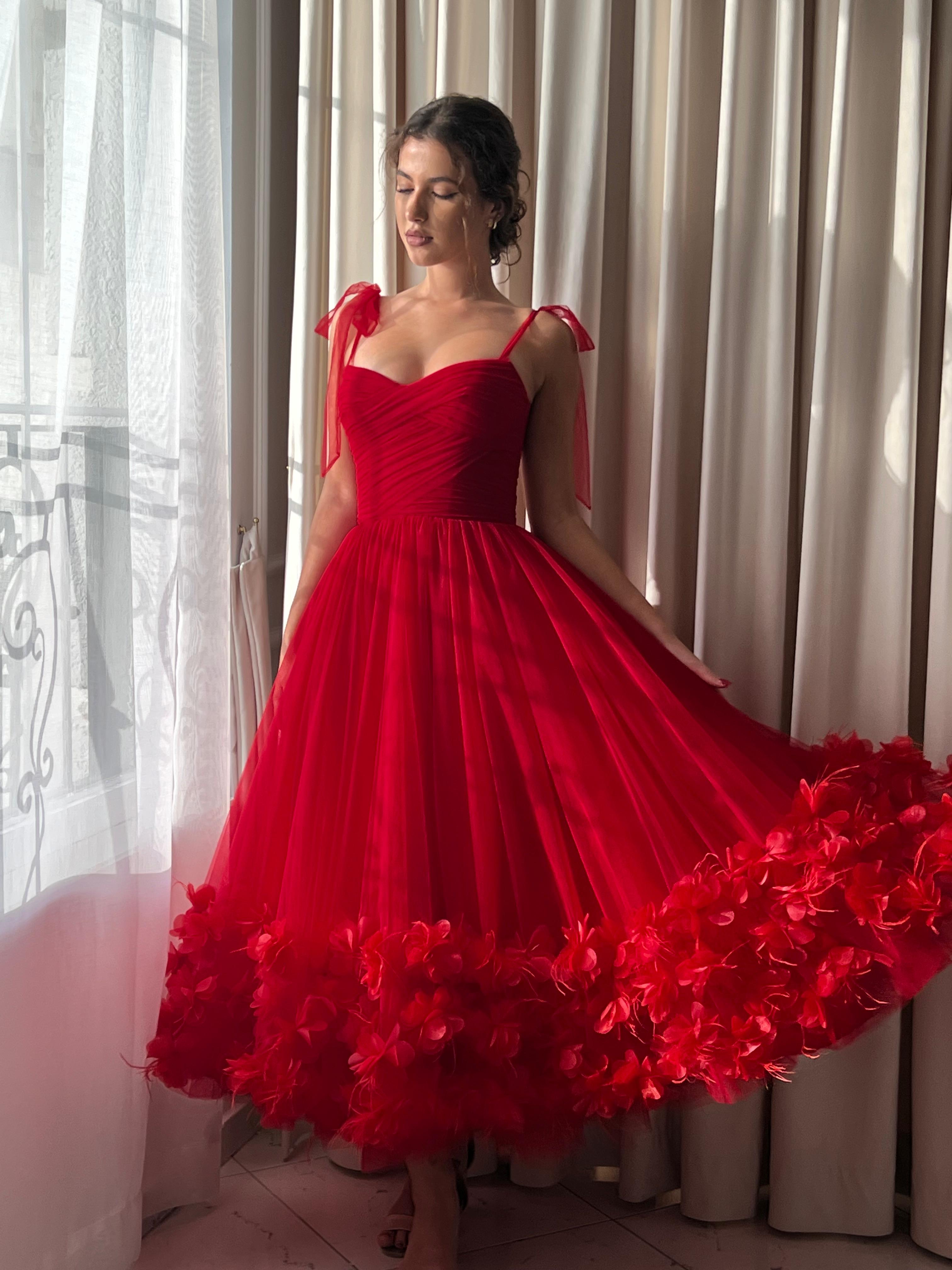 Red midi dress with spaghetti straps and embroidery