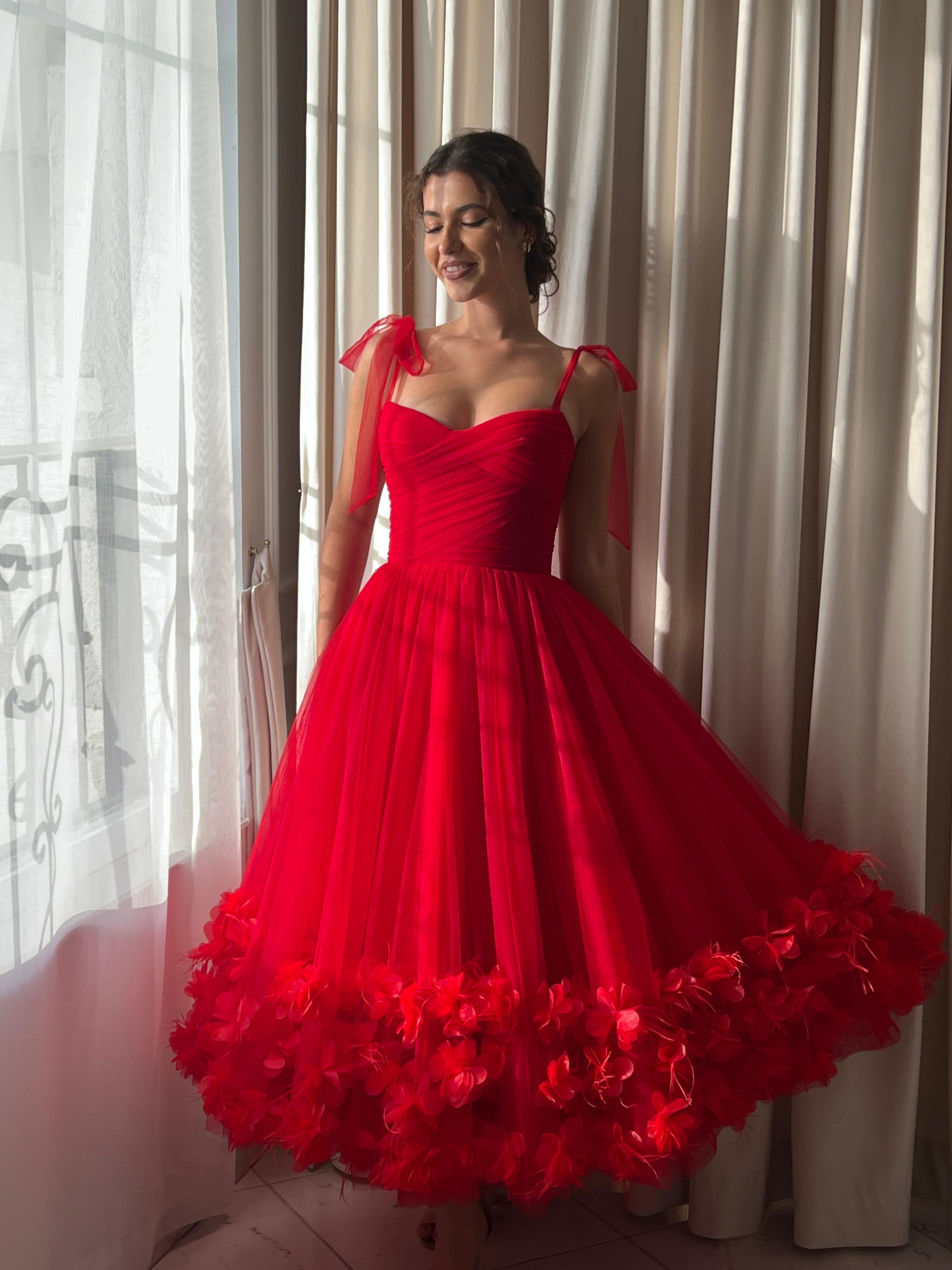 Red midi dress with spaghetti straps and embroidery