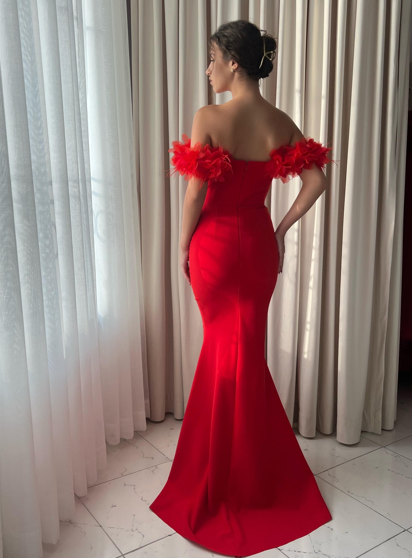 Red mermaid dress with off the shoulder sleeves and embroidery