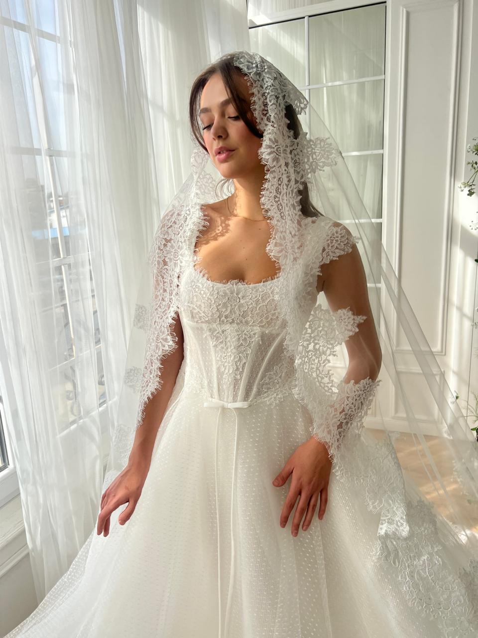 White A-Line bridal gown with straps, embroidery and veil