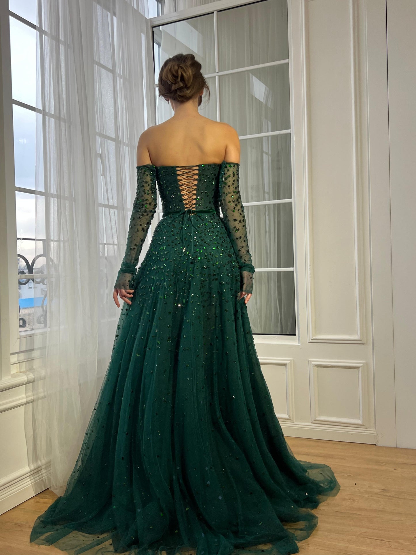 Green A-Line dress with long off the shoulder sleeves and beads