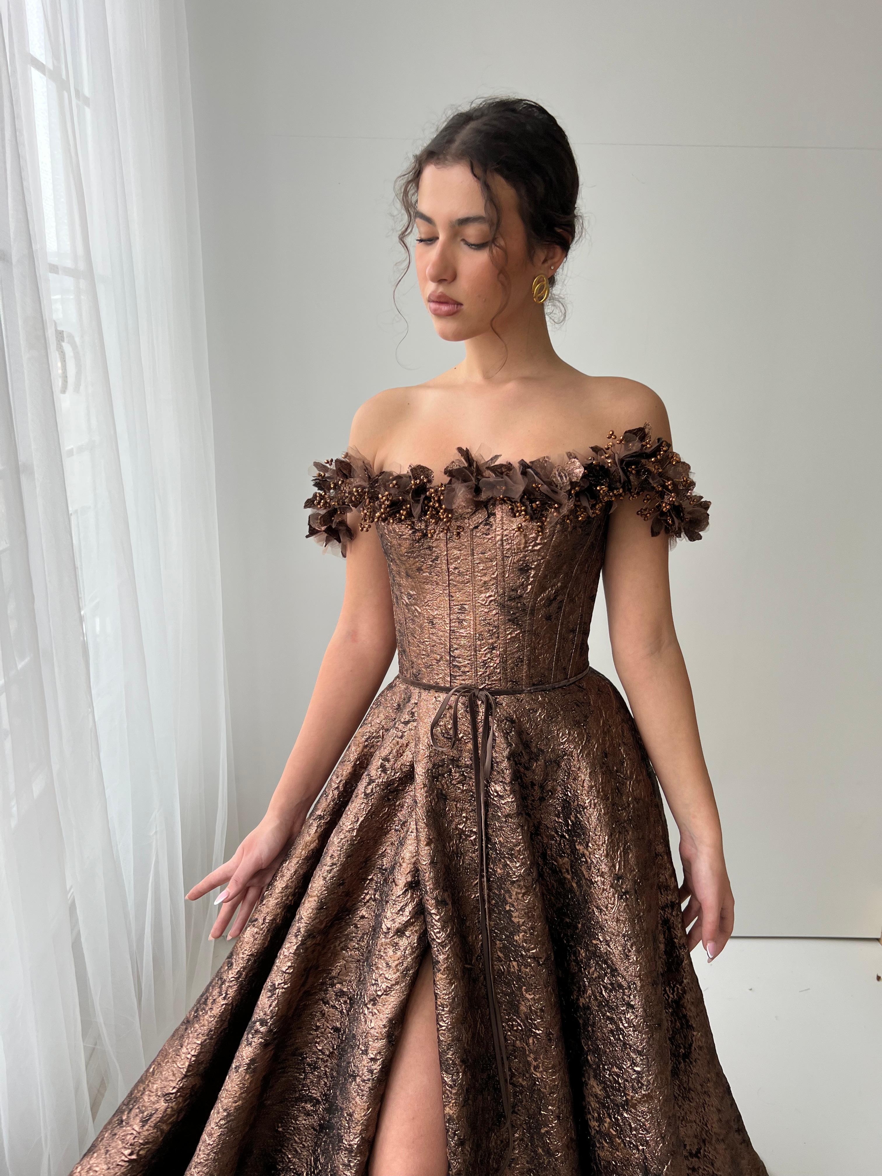 Brown A-Line dress with off the shoulder sleeves, brocade fabric and embroidery