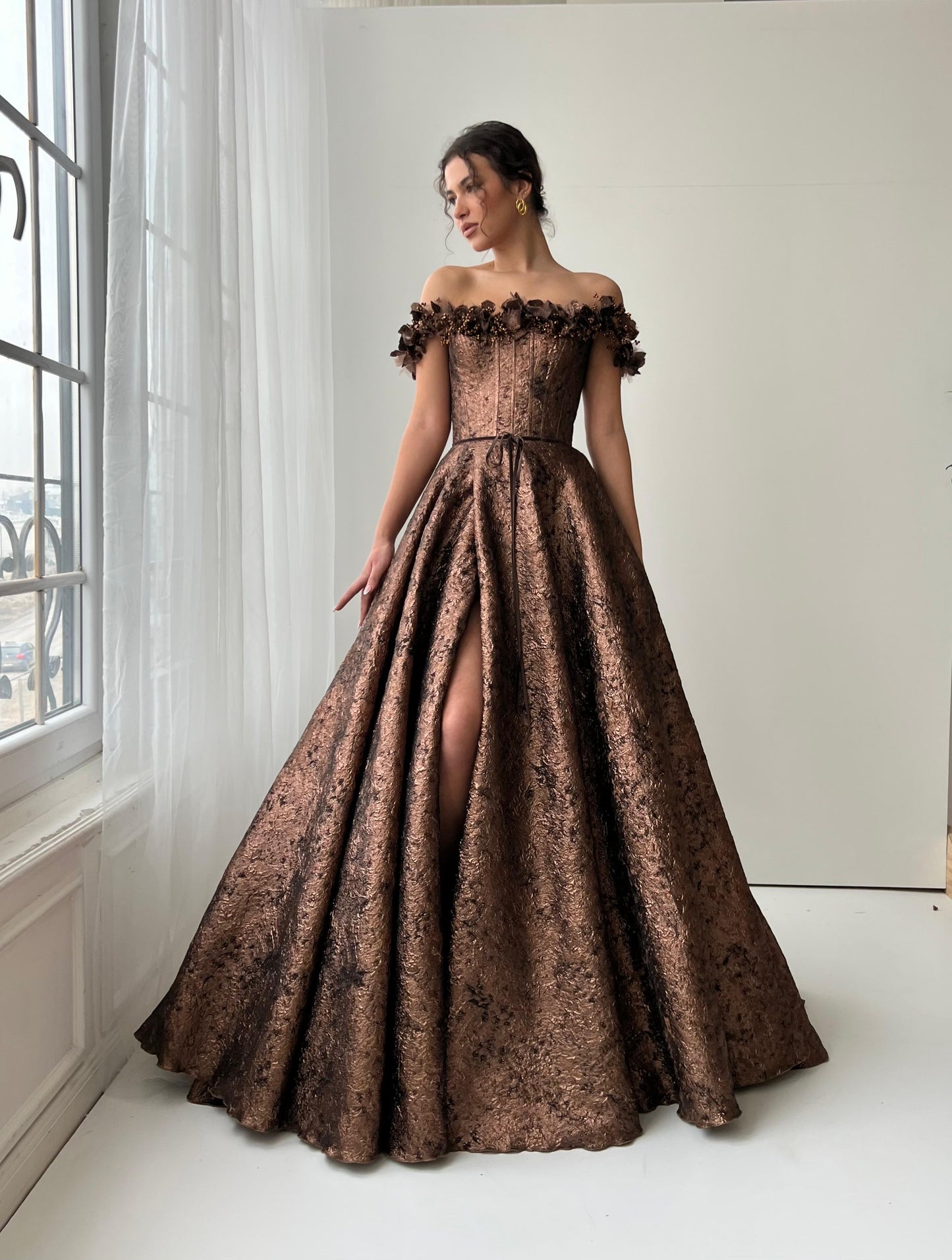 Brown A-Line dress with off the shoulder sleeves, brocade fabric and embroidery