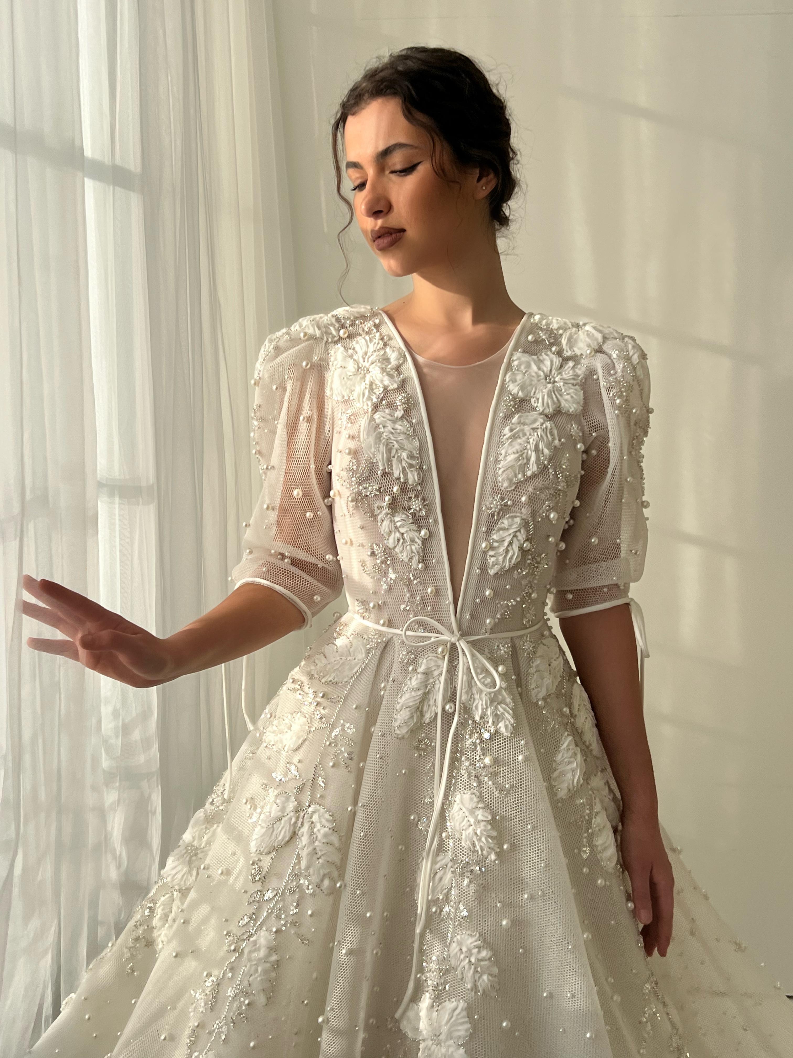 White bridal A-Line gown with short sleeves, v-neck, beading and embroidery