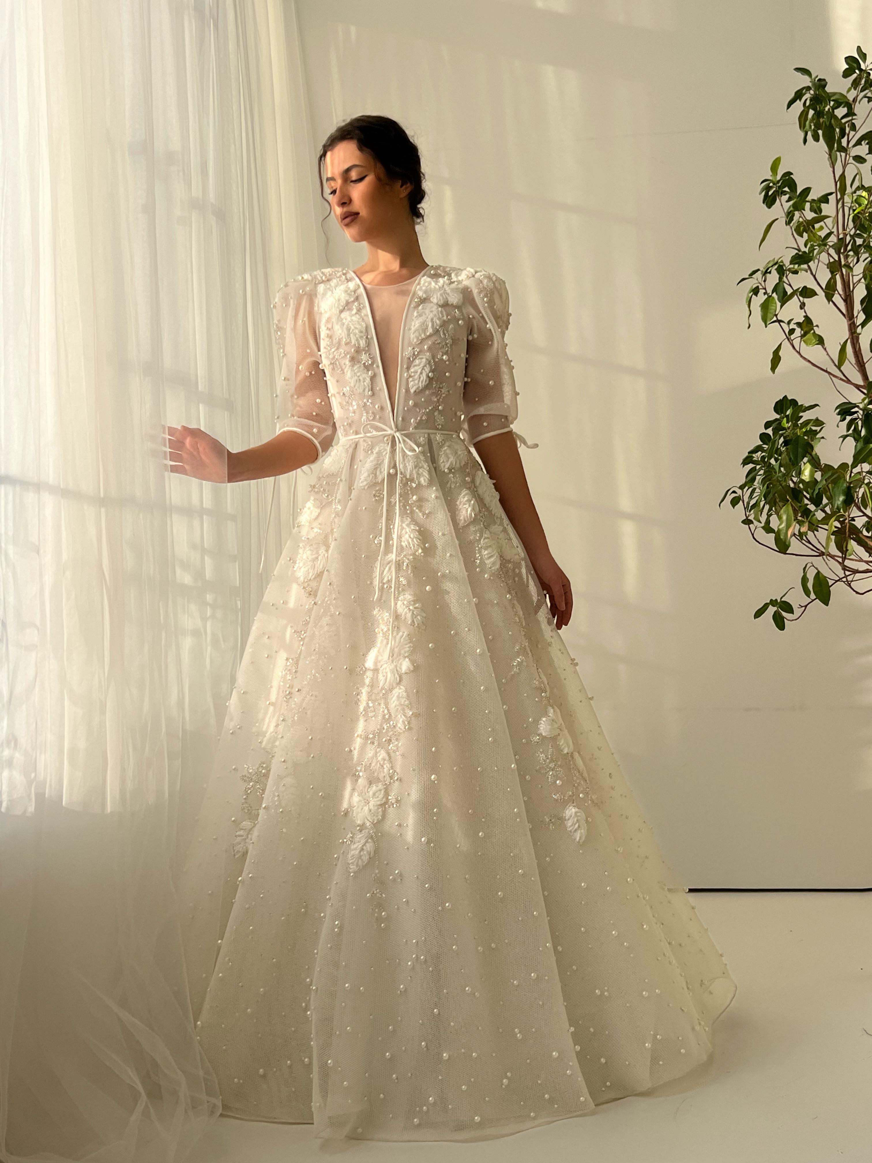 White bridal A-Line gown with short sleeves, v-neck, beading and embroidery