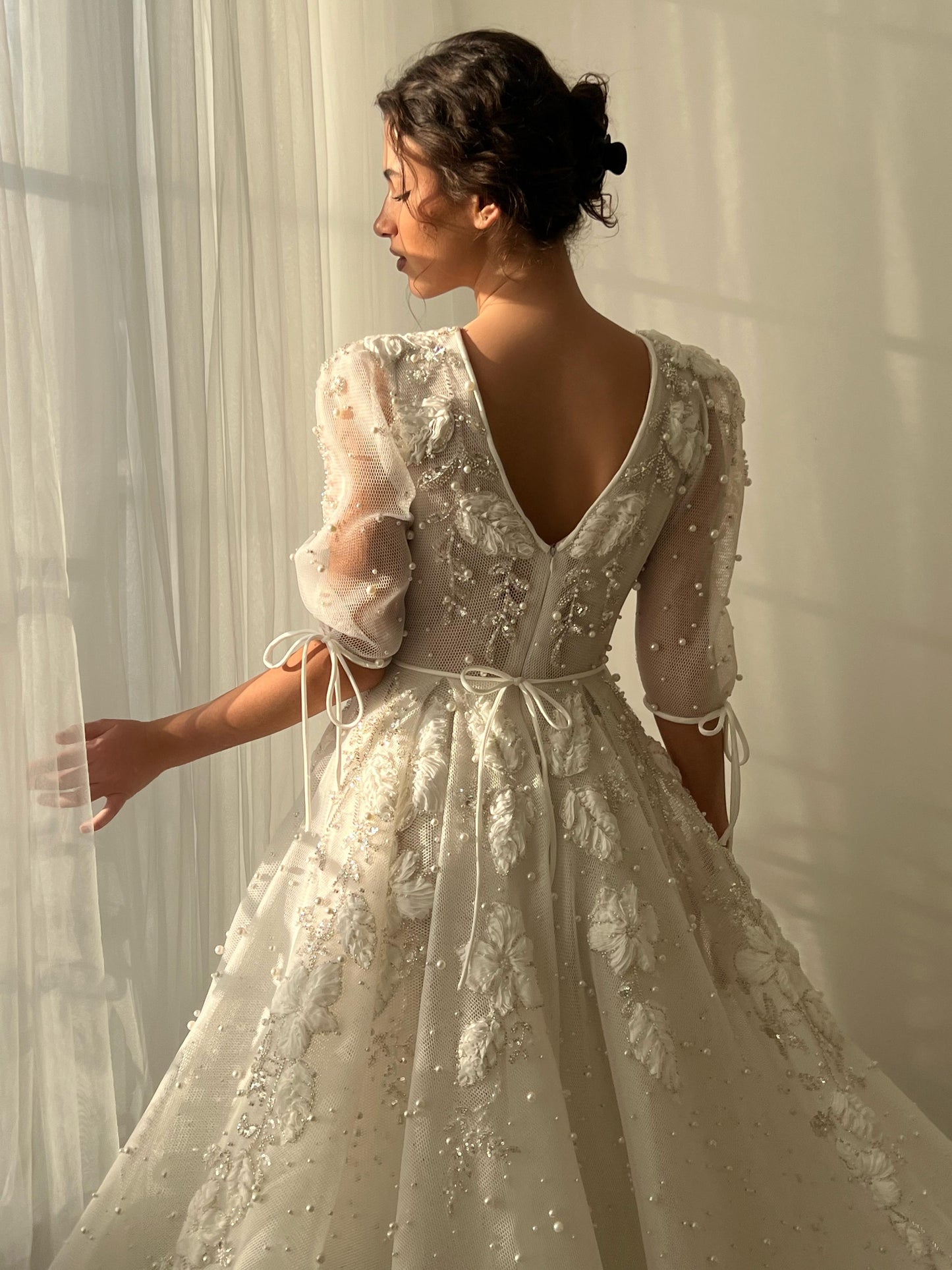 White bridal A-Line gown with short sleeves, v-neck, beading and embroidery