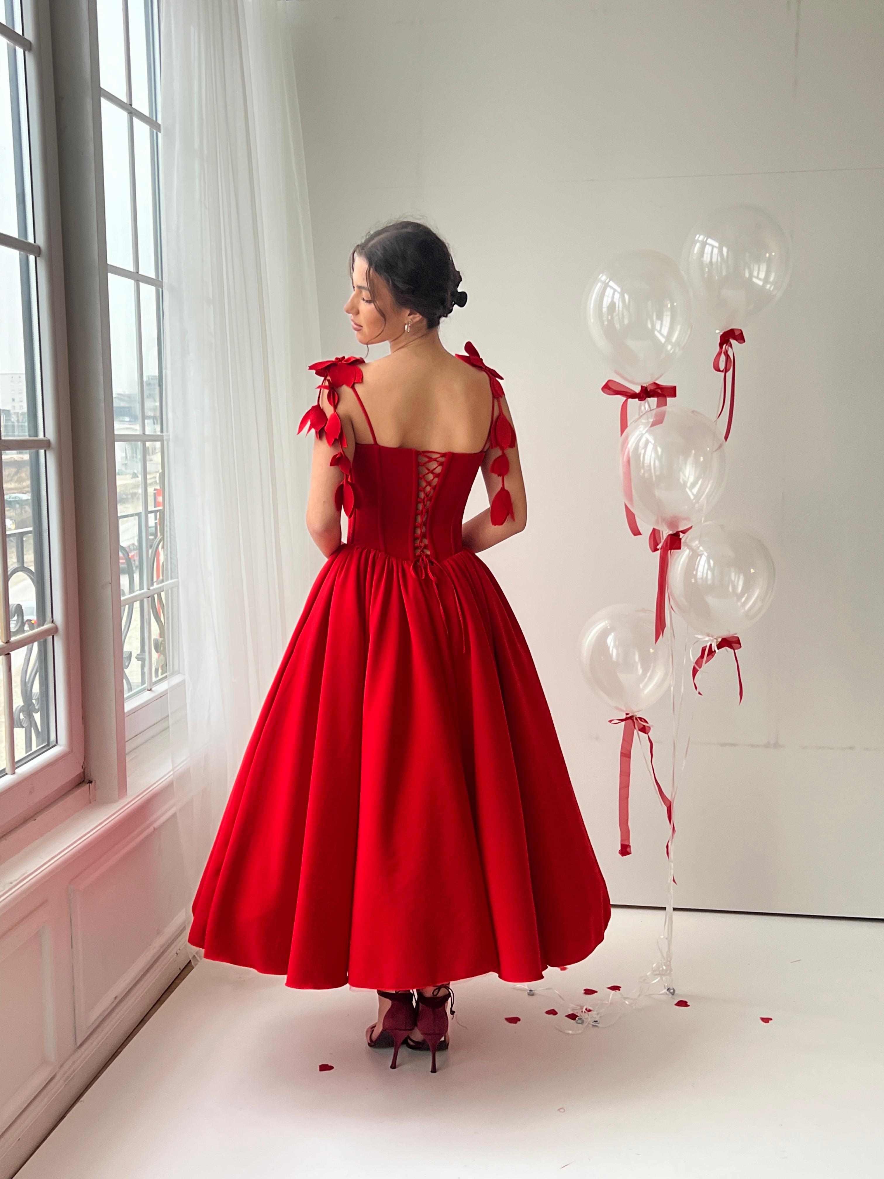 Red midi dress with spaghetti straps and embroidery