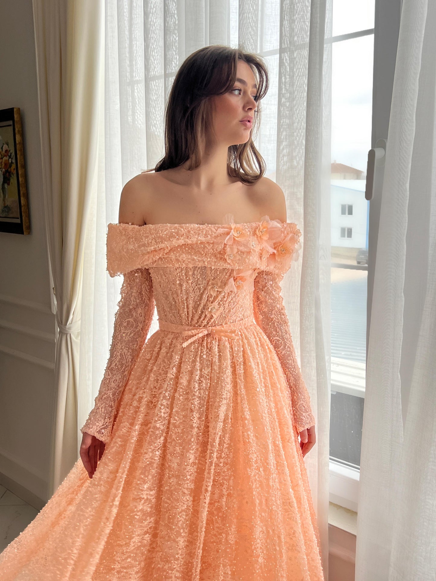 Peach A-Line dress with long off the shoulder sleeves and embroidery