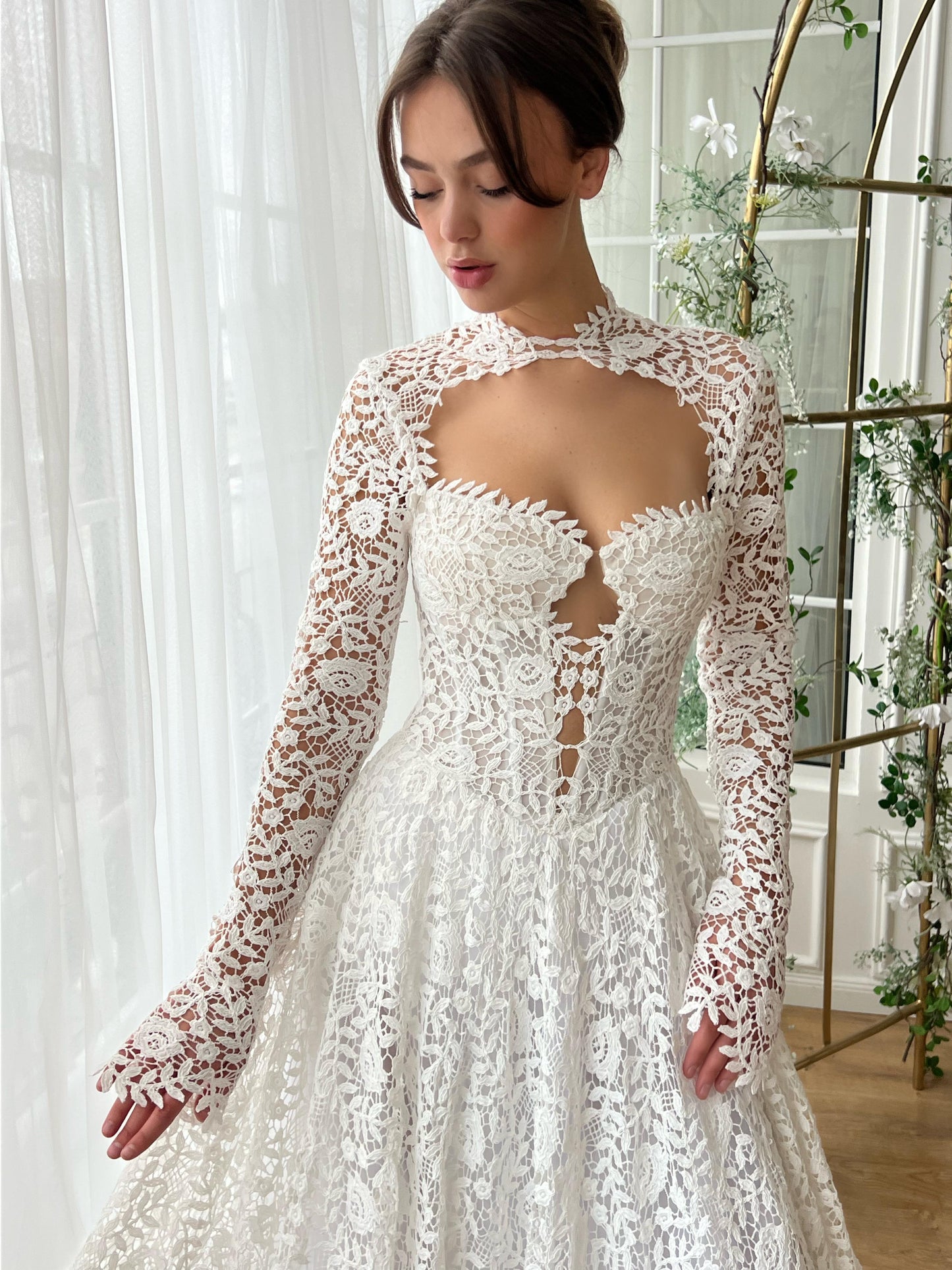 White A-Line bridal dress with long sleeves and embroidered lace