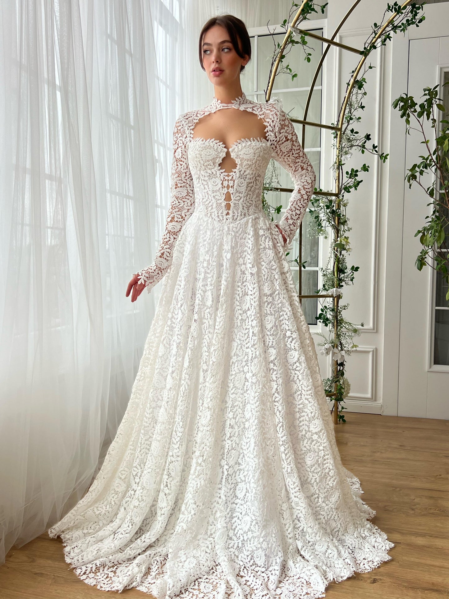 White A-Line bridal dress with long sleeves and embroidered lace