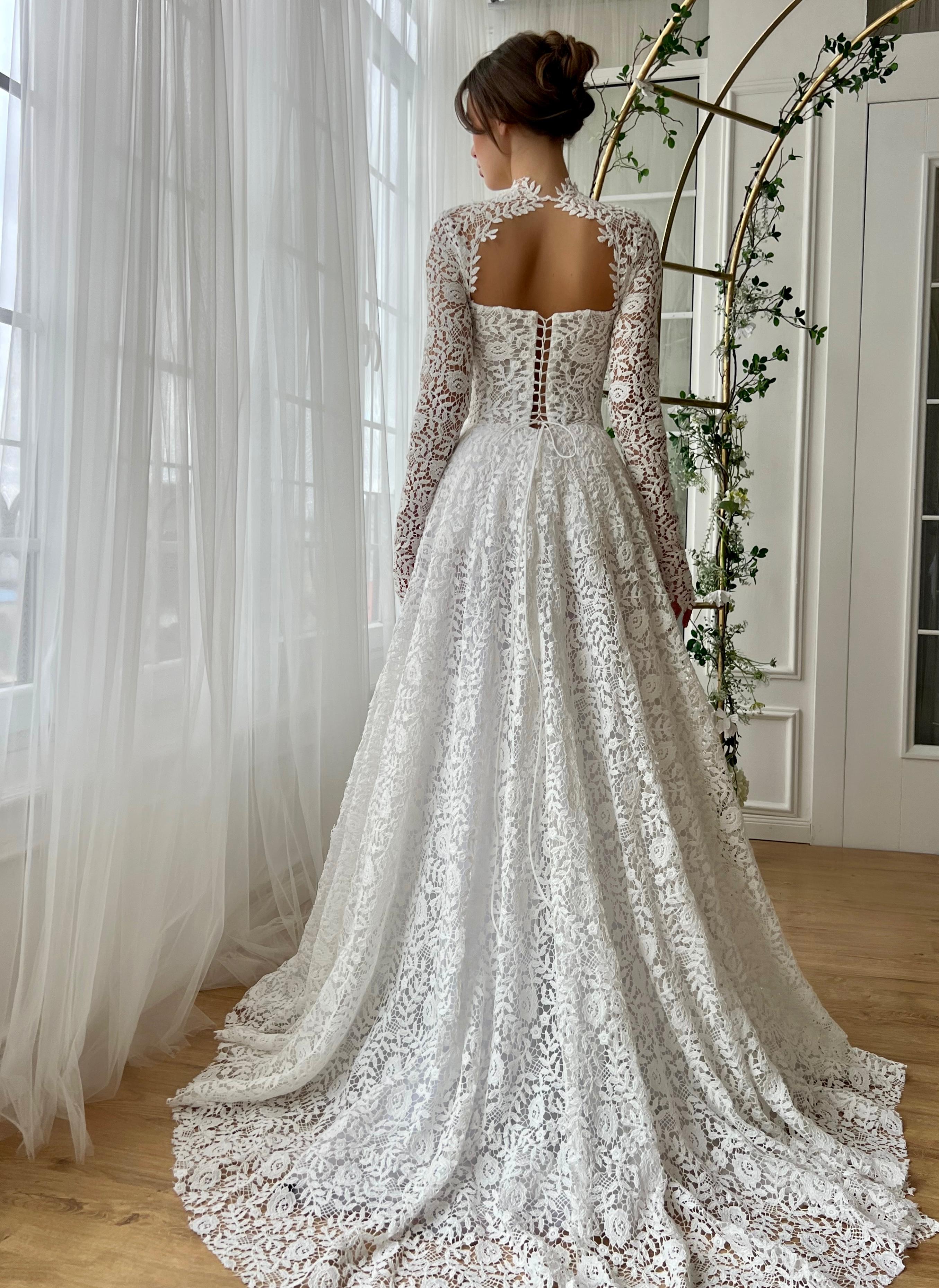 White A-Line bridal dress with long sleeves and embroidered lace