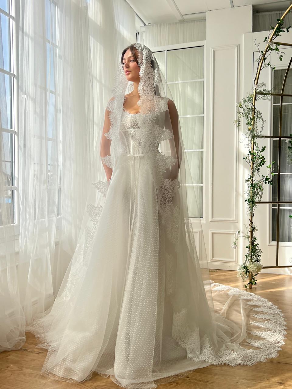 White A-Line bridal gown with straps, embroidery and veil