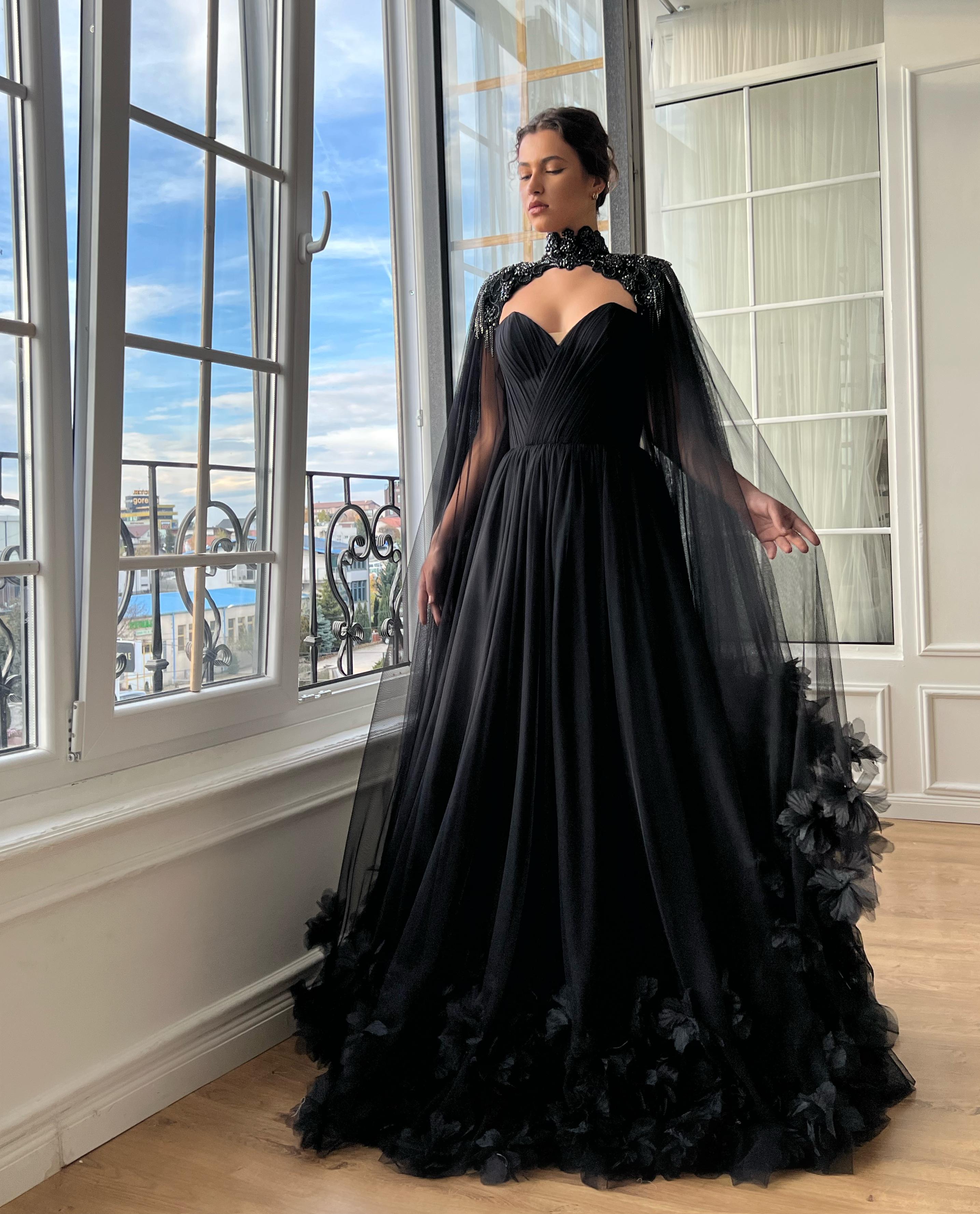 Black A-Line gown with cape, v-neck and embroidery