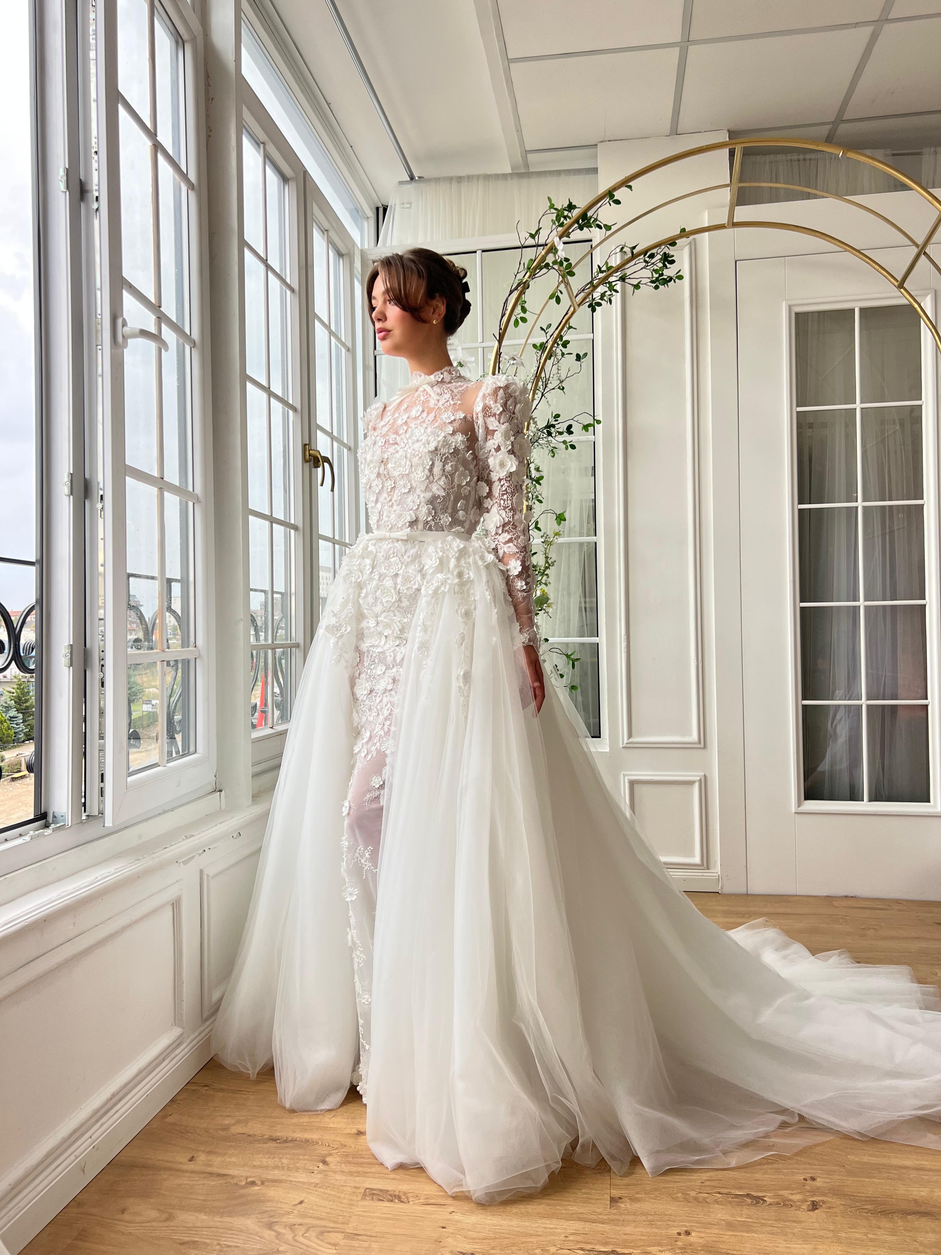 White A-Line bridal gown with long sleeves and embroidery