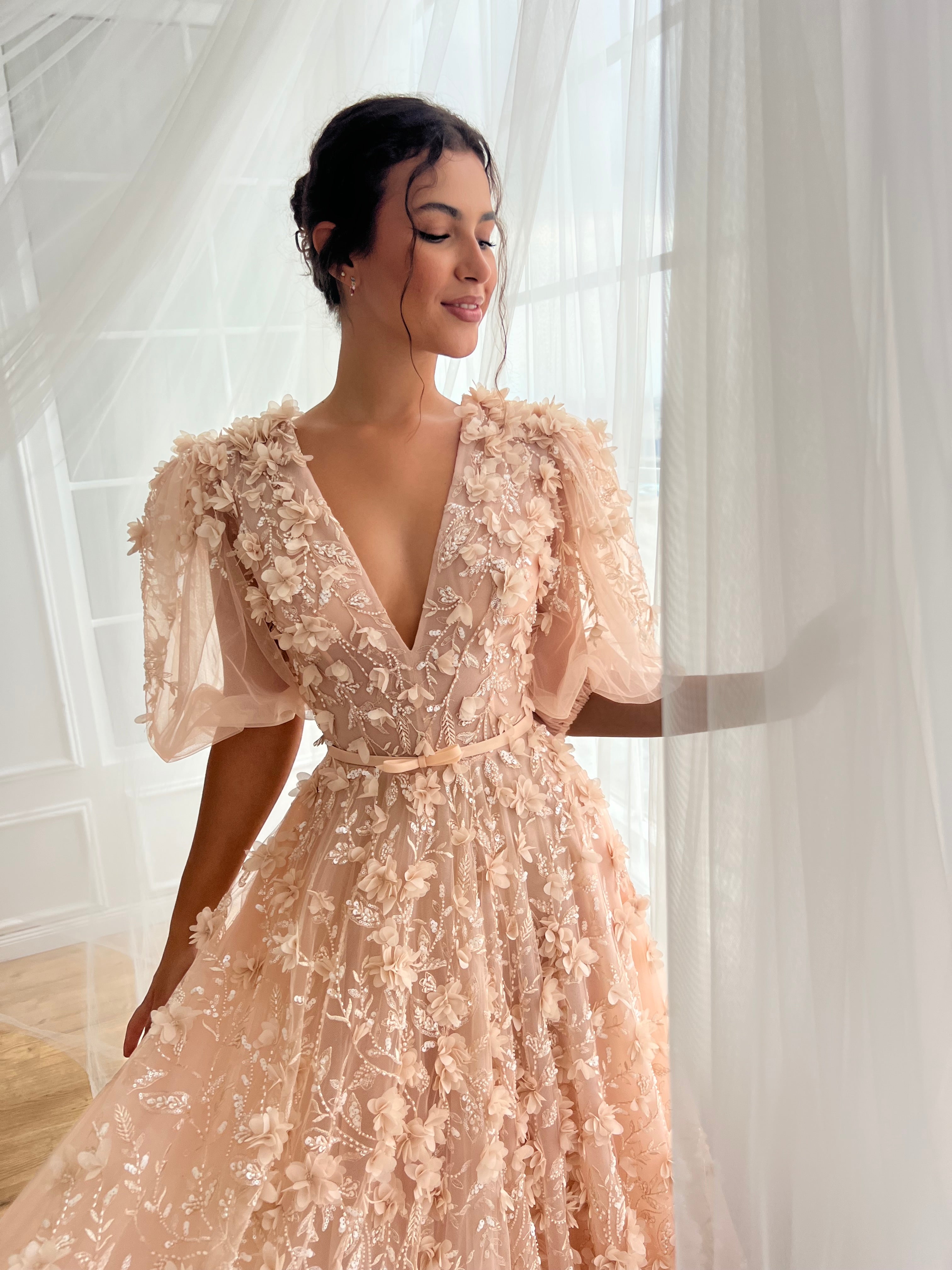 Peach A-Line gown with short sleeves, embroidery and v-neck