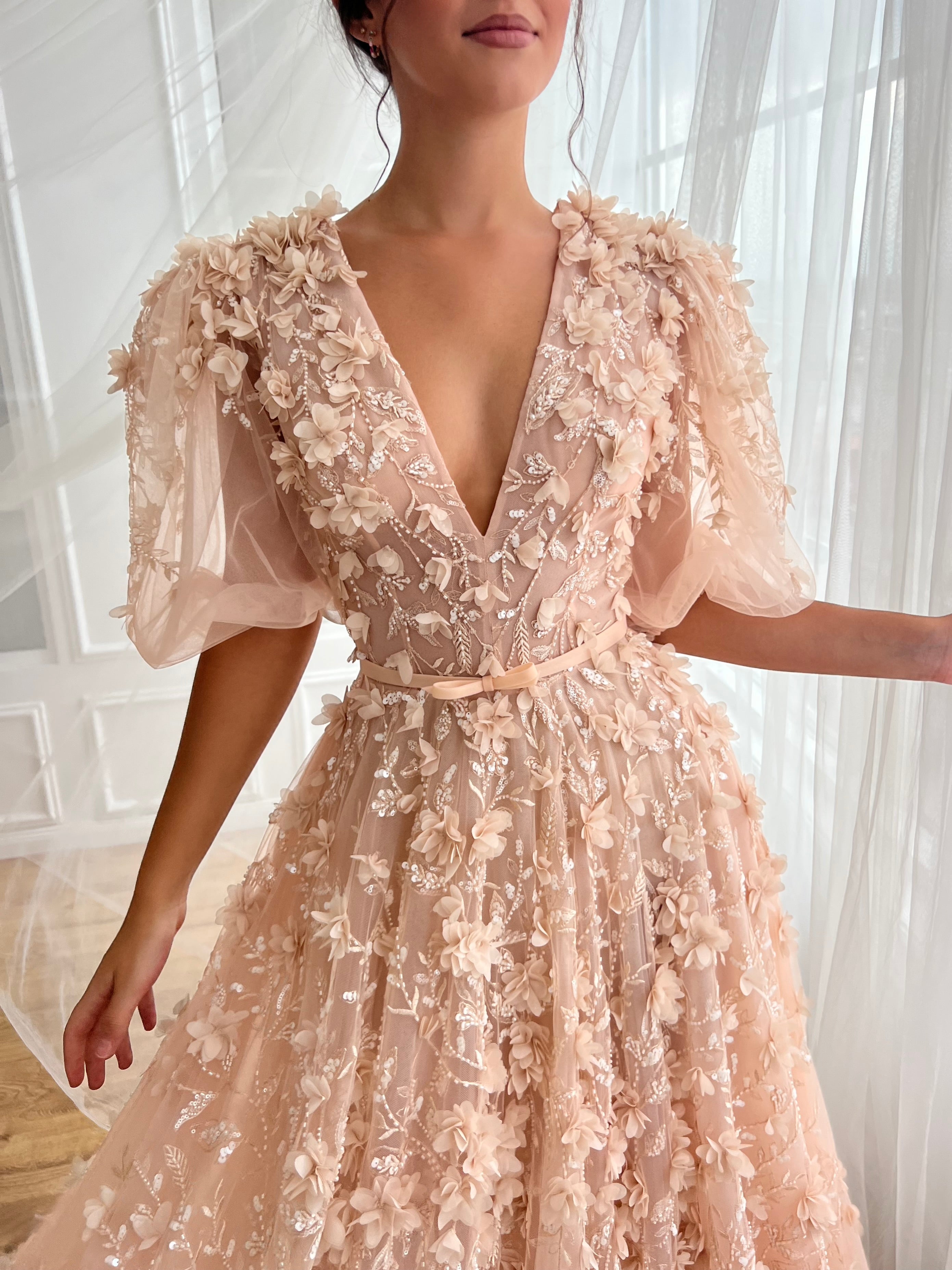 Peach A-Line gown with short sleeves, embroidery and v-neck