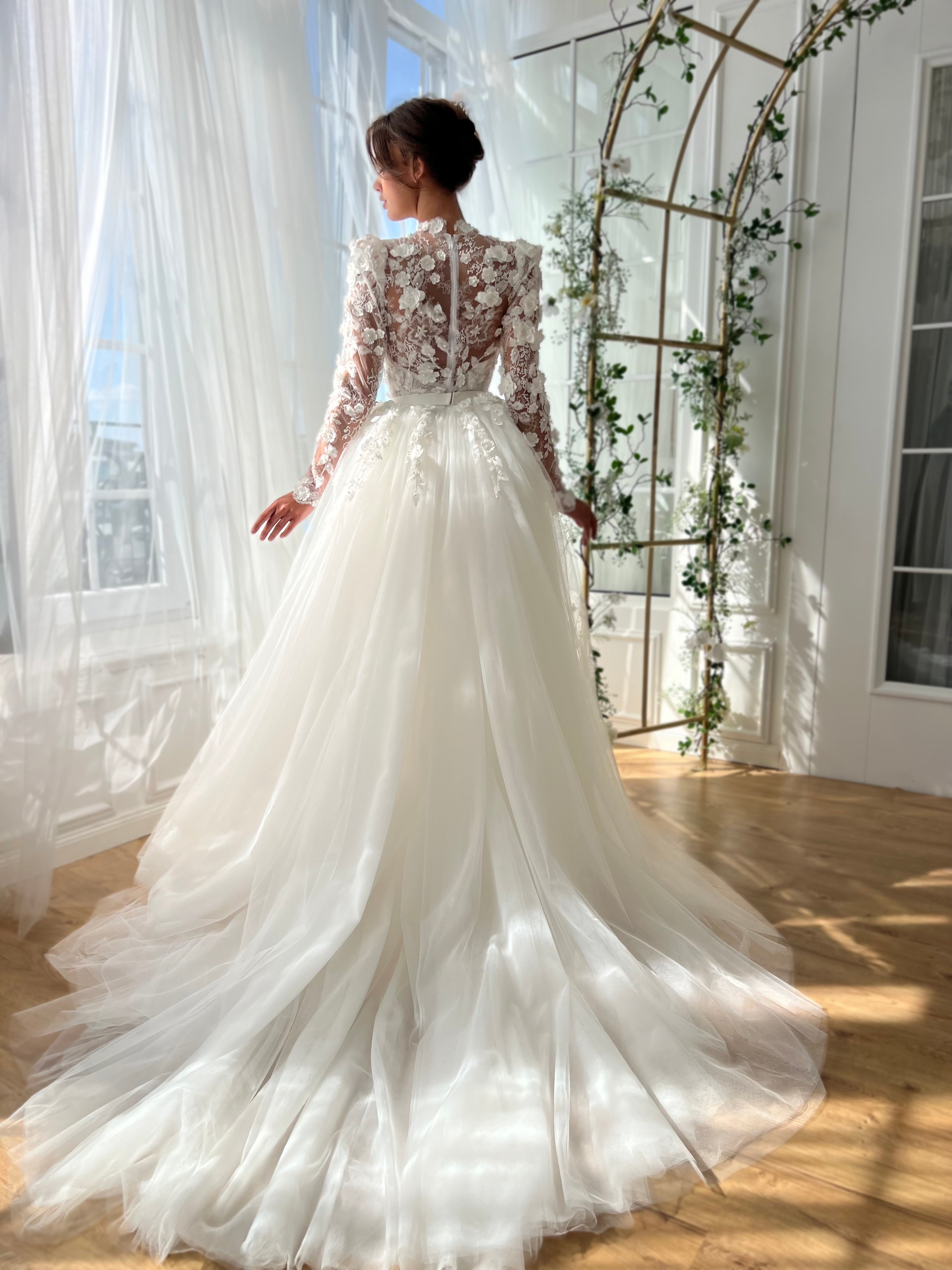 White A-Line bridal gown with long sleeves and embroidery