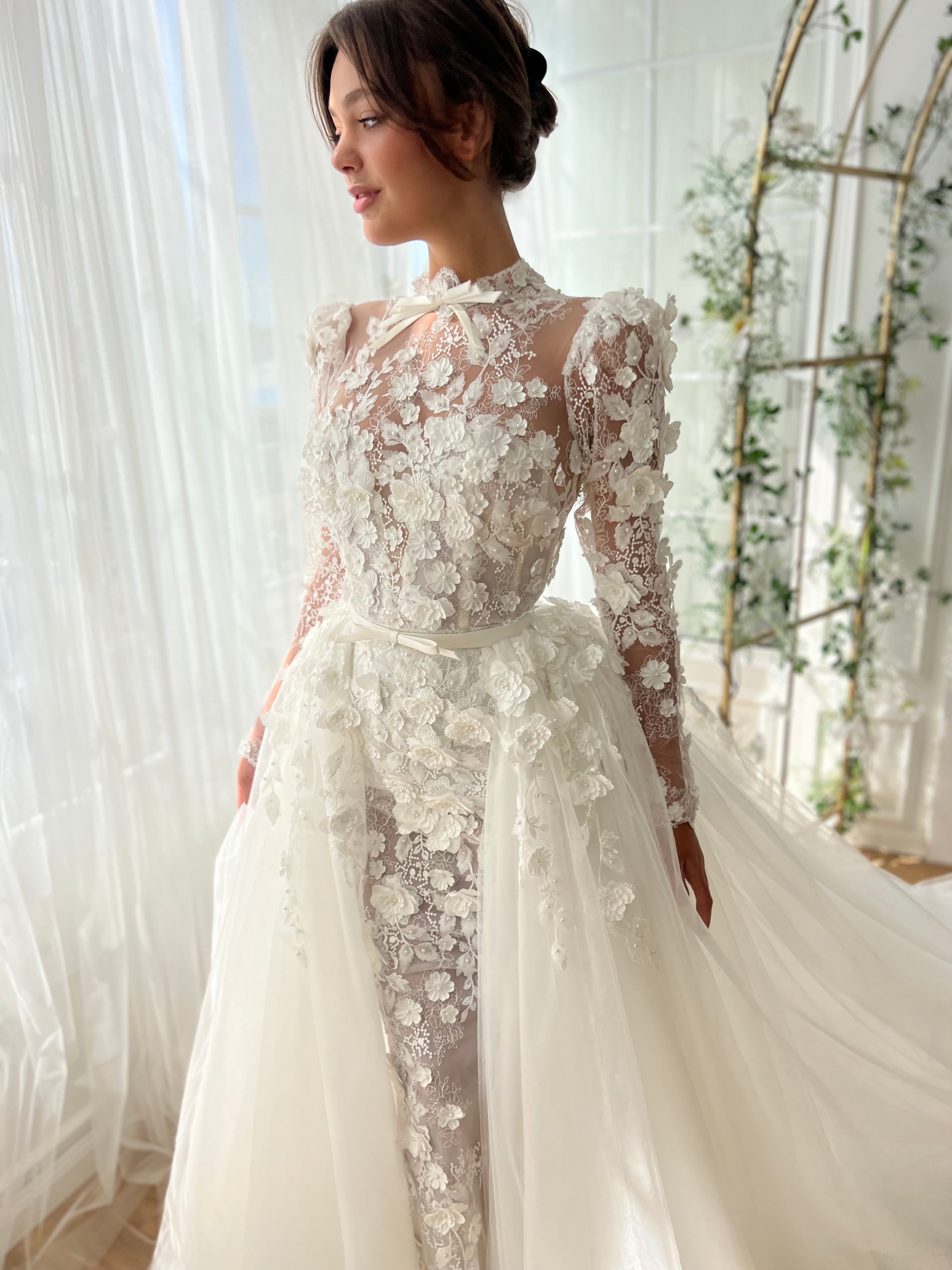 White A-Line bridal gown with long sleeves and embroidery