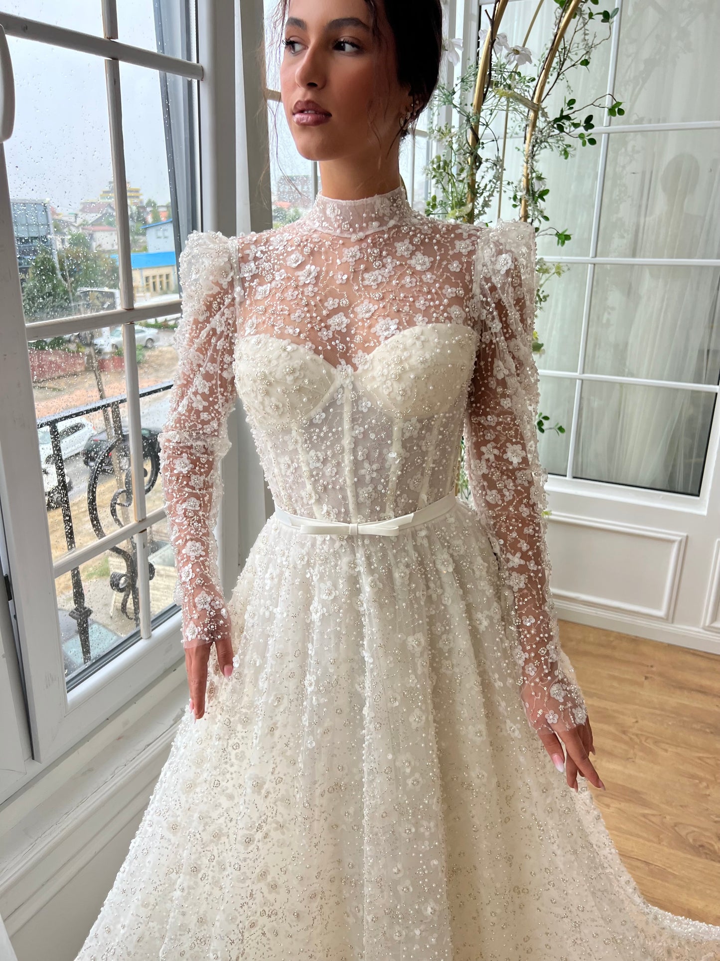 white bridal A-Line gown with long sleeves and embroidery